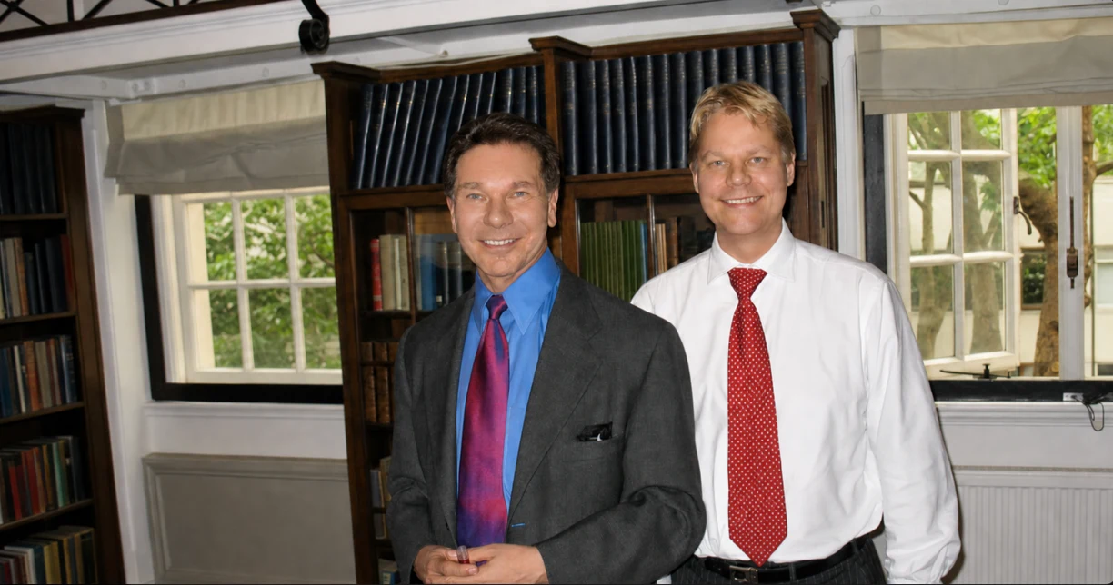 Dr Robert Cialdini and Sami Miettinen standing together at the Influence at Work seminar in London on 13 June 2006